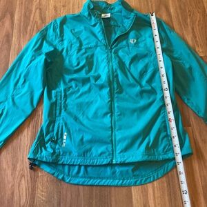 Pearl iZUMi cycling jacket. Teal/jade colored, ladies size S.